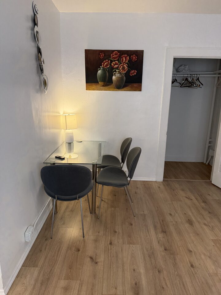 Dining nook with a small table and two chairs