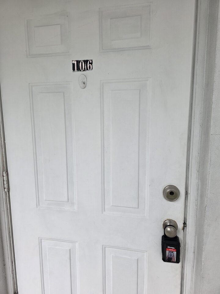 Front door of apartment 106