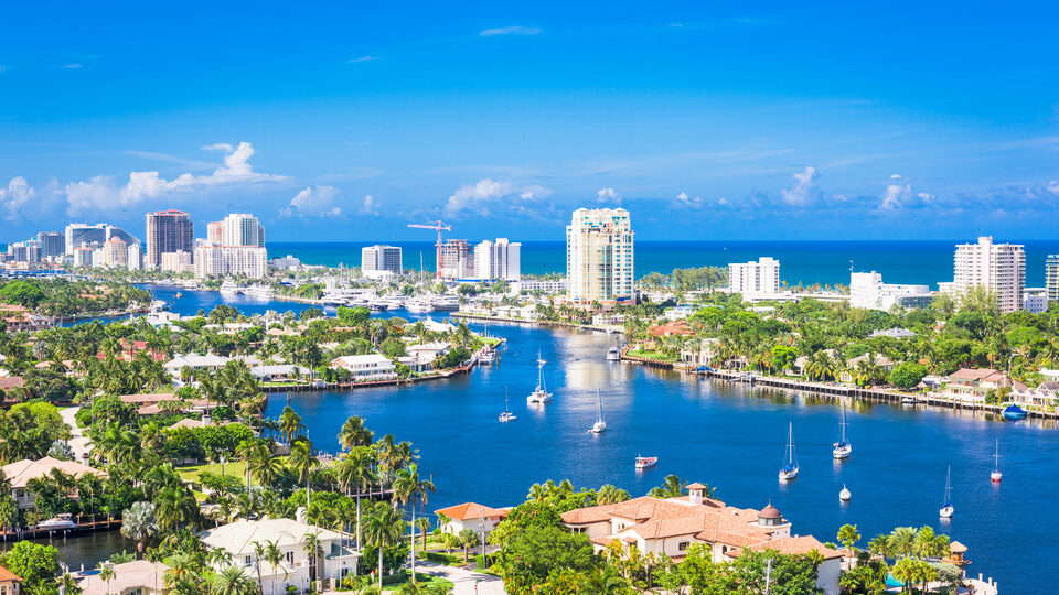 Fort Lauderdale from the air, with the Intracoastal waterway, waterfront homes, sailboats and the Atlantic beyond